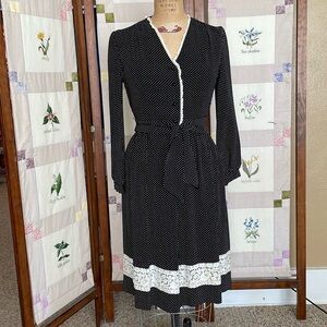 Vintage Herman Marcus black/white polka dot dress w lace trim, balloon sleeves